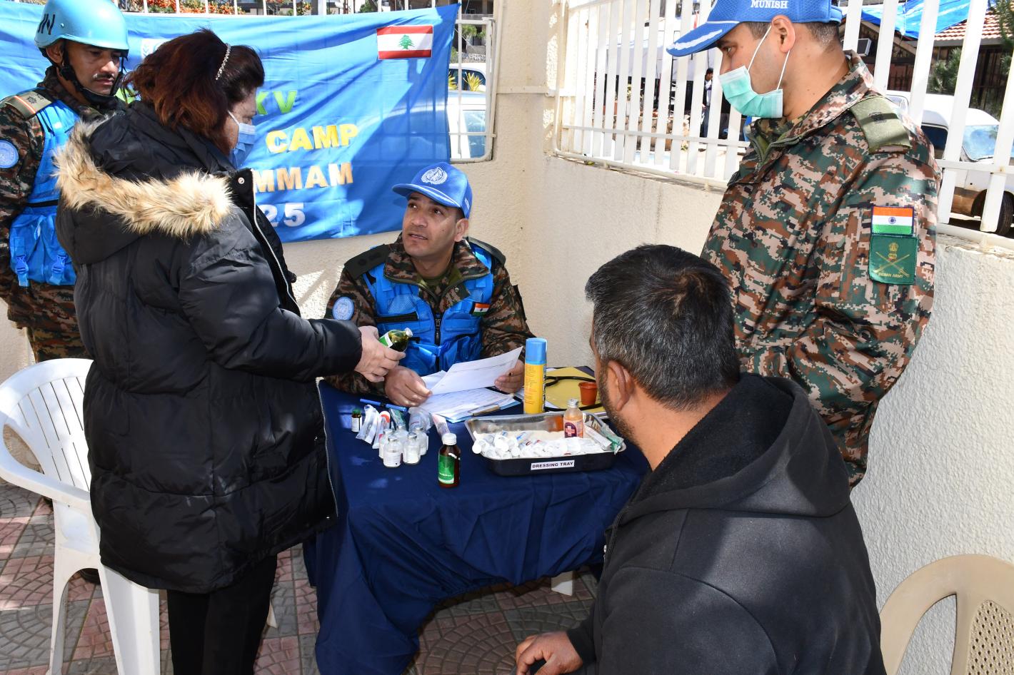 A medical peacekeeper talking with a patient