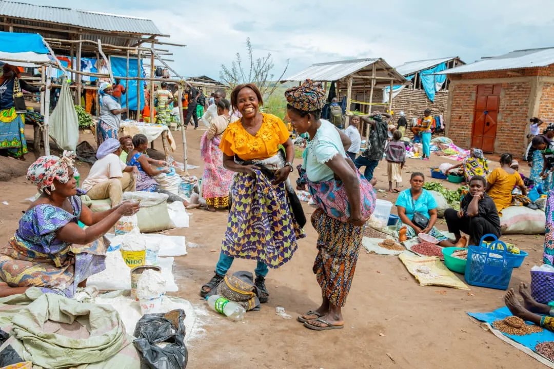 Today, tangible progress is visible. Members of both communities once again attend the same markets.