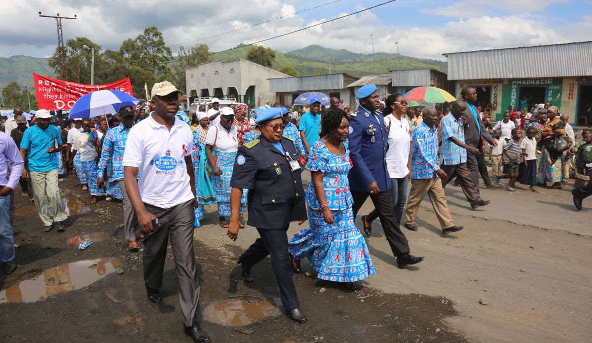 Staff members join match with the people on HIV/AIDS Day in Sake, North Kivu Province